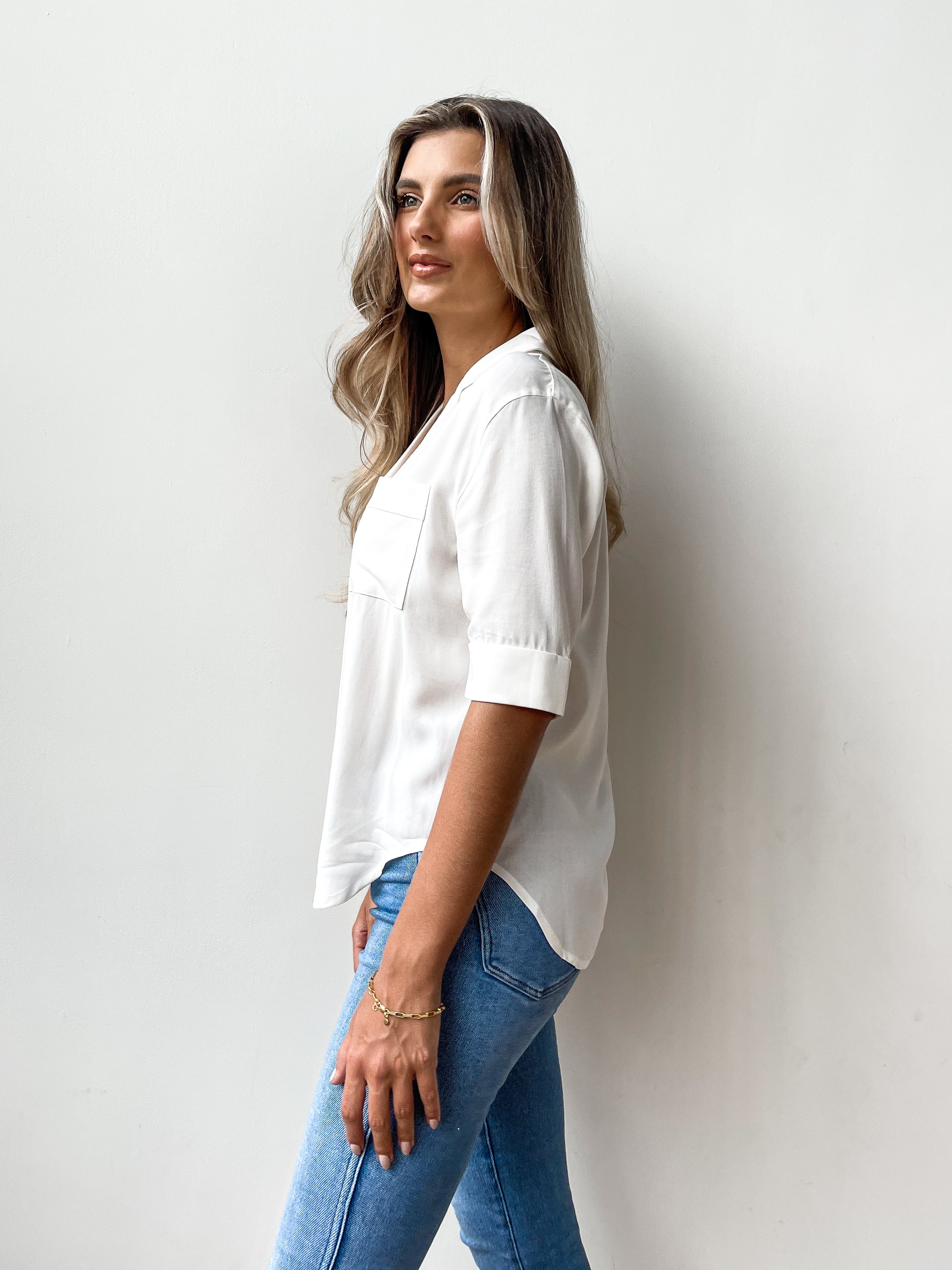 white short sleeve collared button down