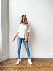 white short sleeve collared button down
